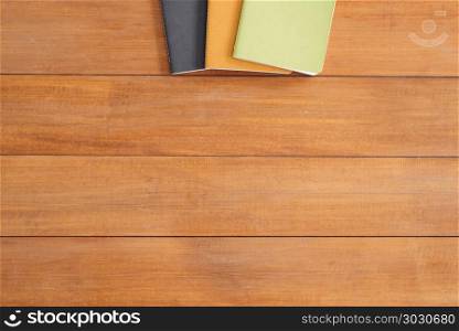 Minimal work space - Creative flat lay photo of workspace desk. . Minimal work space - Creative flat lay photo of workspace desk. Office desk wooden table background with mock up notebooks. Top view with copy space, flat lay photography.