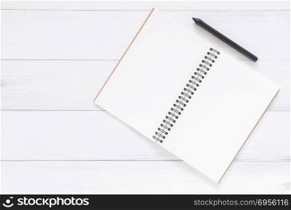 Minimal work space - Creative flat lay photo of workspace desk. . Minimal work space - Creative flat lay photo of workspace desk. White office desk wooden table background with open mock up notebooks and pens and plant. Top view with copy space, flat lay photography