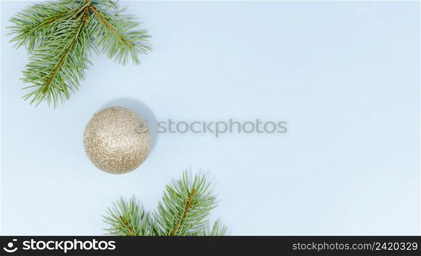 minimalist christmas ball pine leaves with copy space