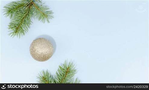 minimalist christmas ball pine leaves with copy space