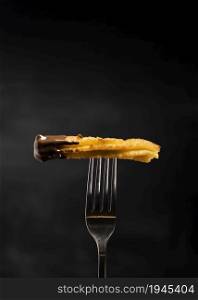 minimalist fried churros fork front view. High resolution photo. minimalist fried churros fork front view. High quality photo