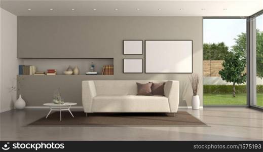 Minimalist living room of a modern villa with sofa and beige wall on background - 3d rendering. Minimalist living room of a modern villa