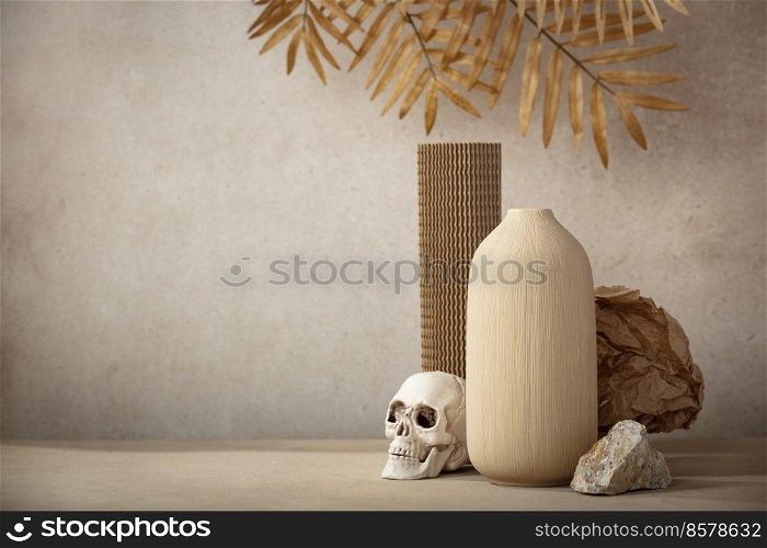 Minimalist monochrome still life composition with ceramic vase, cardboard podium, crumpled paper, natural stone, miniature skull and leaves in beige color, abstract modern art design concept