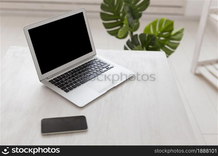 minimalist office high view laptop monstera. Resolution and high quality beautiful photo. minimalist office high view laptop monstera. High quality and resolution beautiful photo concept