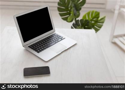 minimalist office high view laptop monstera. Resolution and high quality beautiful photo. minimalist office high view laptop monstera. High quality and resolution beautiful photo concept
