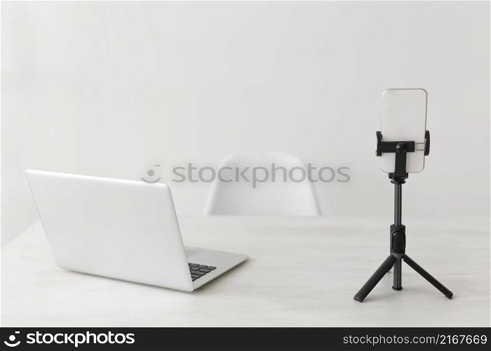 minimalist office laptop mobile phone