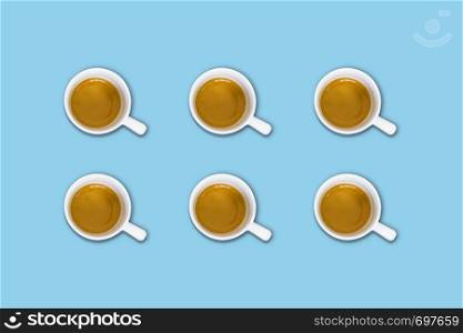 minimalist pattern with a top view of a group of coffee cups on a light blue pastel table. Flat lay photography