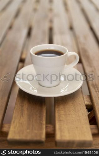 minimalistic coffee cup wooden table. High resolution photo. minimalistic coffee cup wooden table. High quality photo