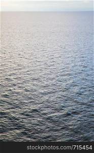 Minimalistic seascape - sea water surface may be used as background