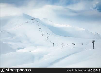 Minimalistic ski resort view with chairlift