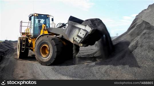 Mining wheel loader for transporting Manganese for processing, Manganese Mining and processing in South Africa