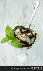 Mint ice cream with chocolate sauce