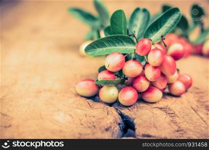 Miracle fruit on old wooden table