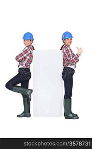Mirror image of female builder