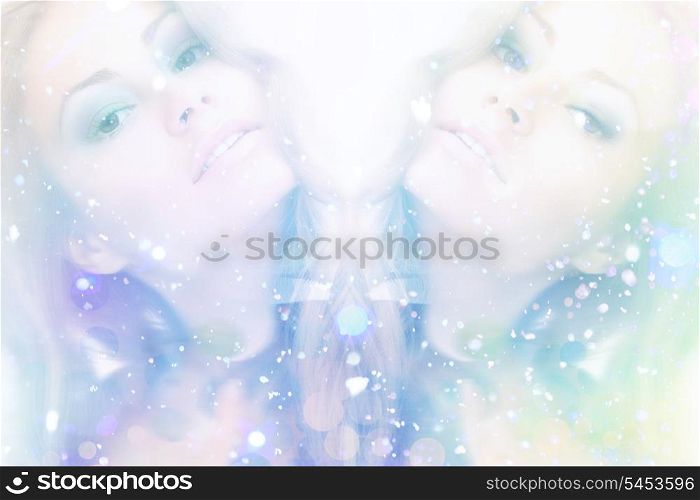 mirrored picture of beautiful woman with long hair