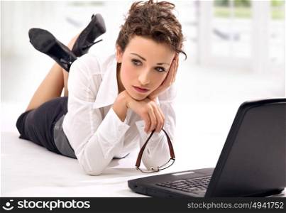 Miserable, young businesswoman thinkinh about career