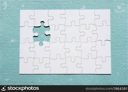 missing piece puzzle blue textured backdrop. High resolution photo. missing piece puzzle blue textured backdrop. High quality photo
