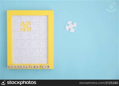 missing white jigsaw puzzle frame blue background