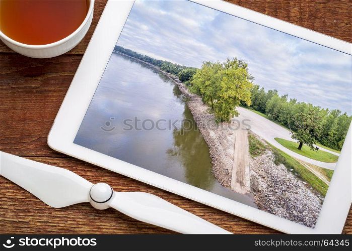 Missouri RIver boat ramp at Dalton Bottom - reviewing aerial image on a digital tablet