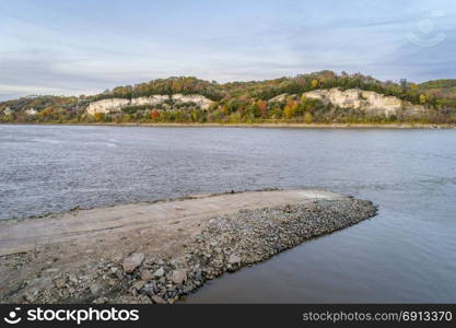 Missouri River near Rocheport, MO (Taylor&rsquo;s Landing), old boat ramp and Katy Trail under high cliff - aerial view in late October evening