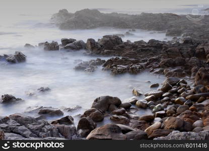 mist in the ocean, coast of north of spain