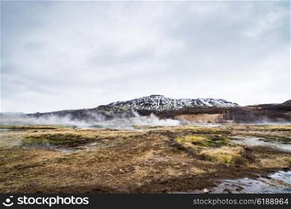 Misty landscape from Iceland with steam coming up from the ground