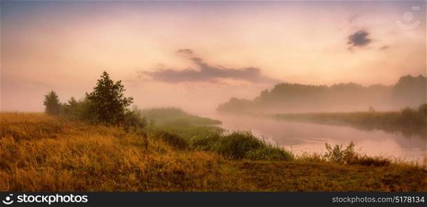 Misty river in the morning. Panorama. Warm summer morning. Summer misty sunrise panoramic landscape