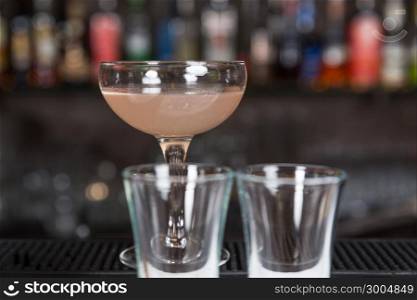 mix alcohol cocktail in glass on bar for party