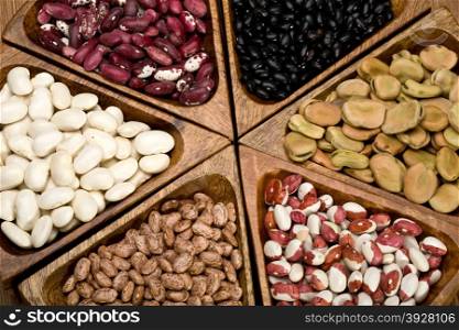 mix of bean and pea on wooden background