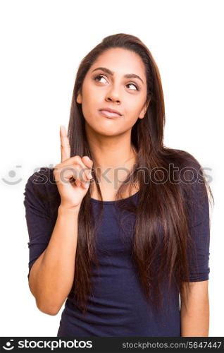Mix race woman pointing up over white background