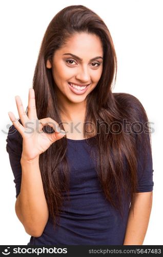 Mix race woman showing ok sign over white background