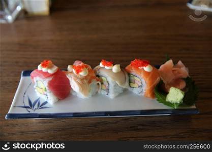 mix sushi rolls with tuna salmon shrimp sushi maki , japanese food