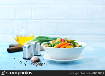 mix vegetables in bowl and on a table