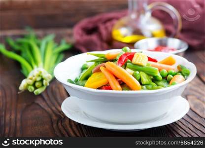mix vegetables in bowl and on a table