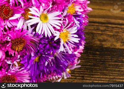 mixed bouquet chrysanthemum on wooden background