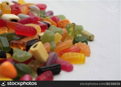 Mixed candy in various colors, shapes and sizes