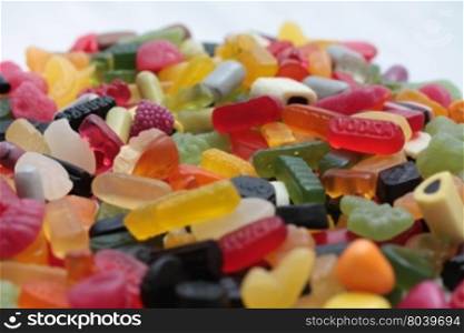 Mixed candy in various colors, shapes and sizes