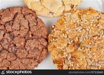 Mixed cookies on a white plate