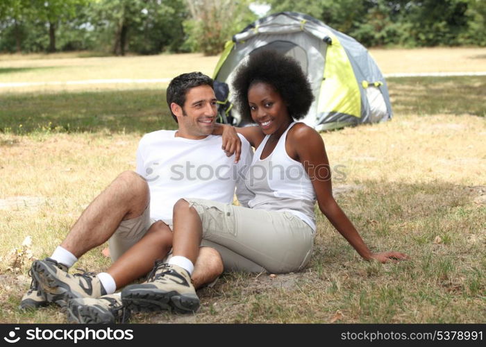 mixed couple camping