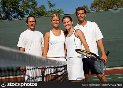Mixed Doubles Tennis Players at Net