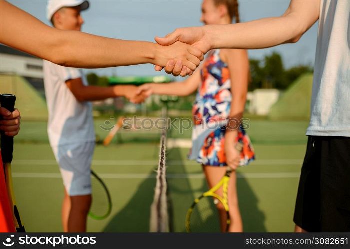 Mixed doubles tennis tournament, outdoor court. Active healthy lifestyle, people play sport game with racket and ball, fitness workout with racquets. Mixed doubles tennis tournament, outdoor court