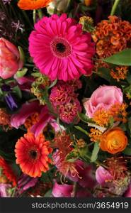 Mixed flower arrangement in different shades of pink and orange