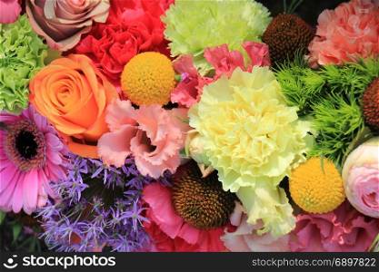Mixed flower arrangement: various flowers in different pastel colors for a wedding
