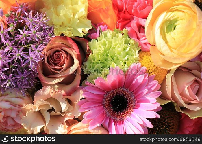 Mixed flower arrangement: various flowers in different pastel colors for a wedding. pastel wedding flowers