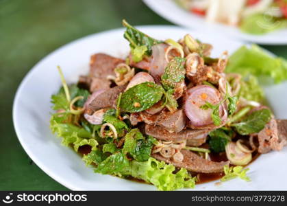 mixed fresh vegetable and steamed liver , Thai spicy salad