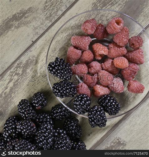 mixed fruits. Raspberries and blackberries. Mixed fresh fruits raspberries and blackberries