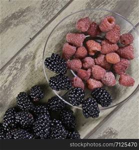 mixed fruits. Raspberries and blackberries. Mixed fresh fruits raspberries and blackberries