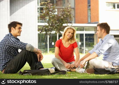 Mixed group of students outside college