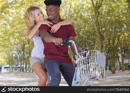 mixed lovely couple have outdoors