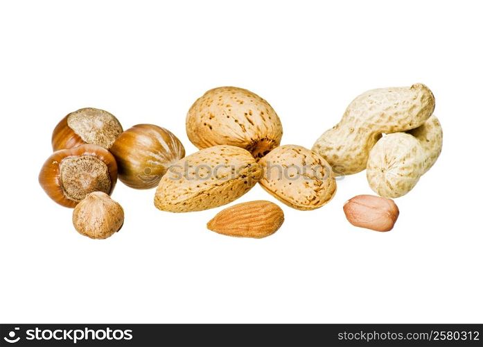 Mixed nuts over white background isolated